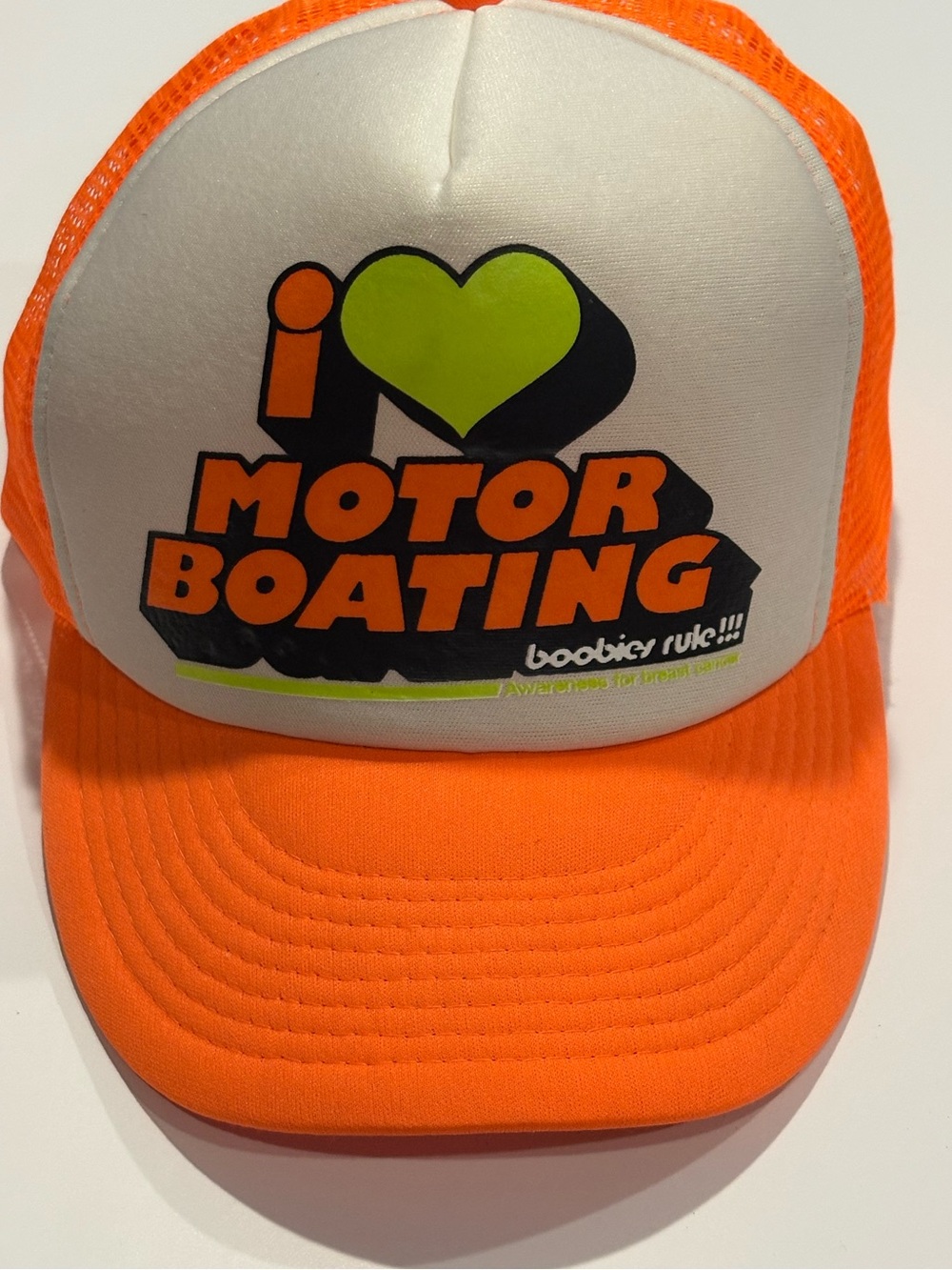 I Love Motor Boating Neon Orange Trucker Hat - Breast Cancer Awareness